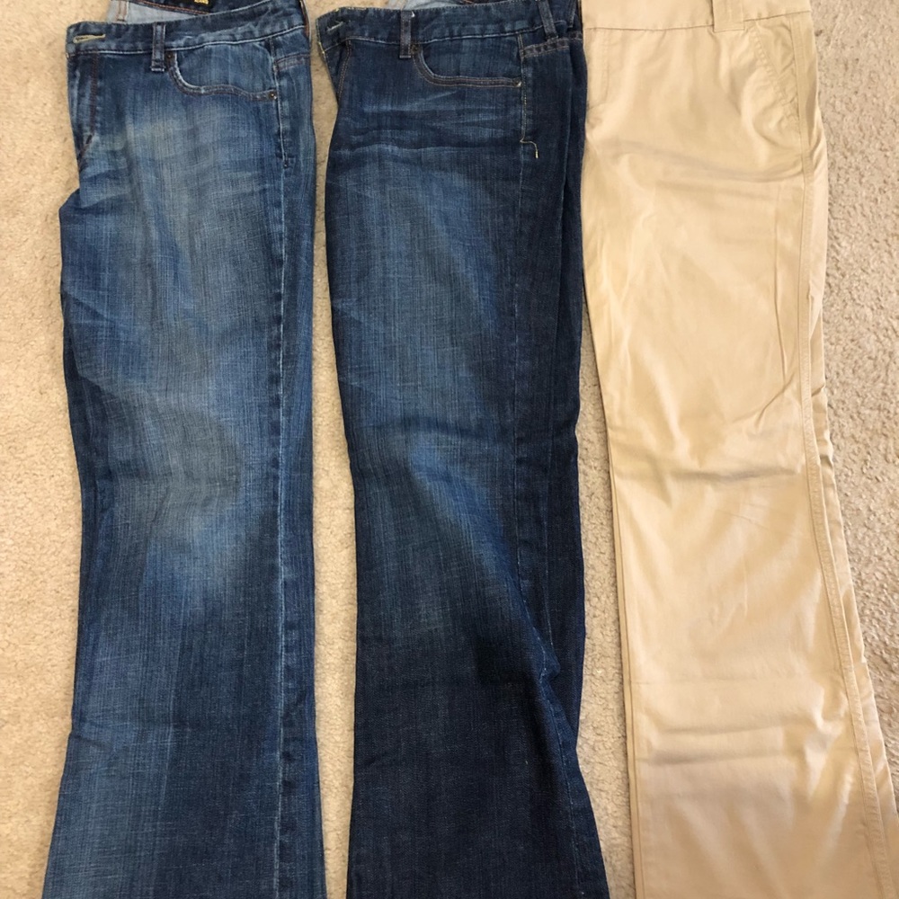 Three pairs of bootcut Express pants